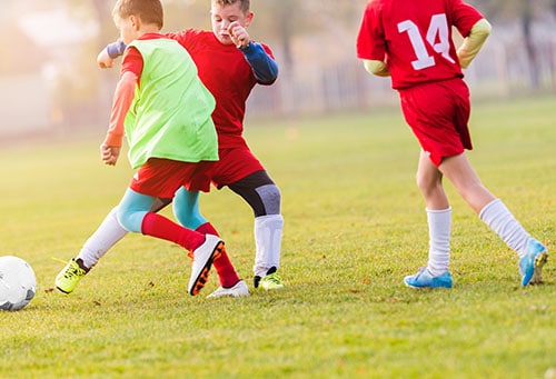 children playing soccer children playing soccer