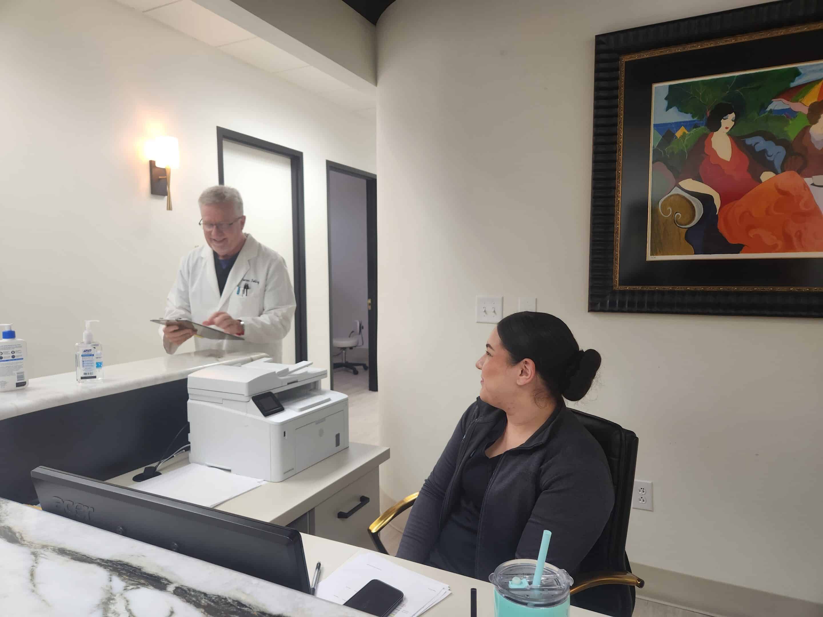 doctor and staff in office